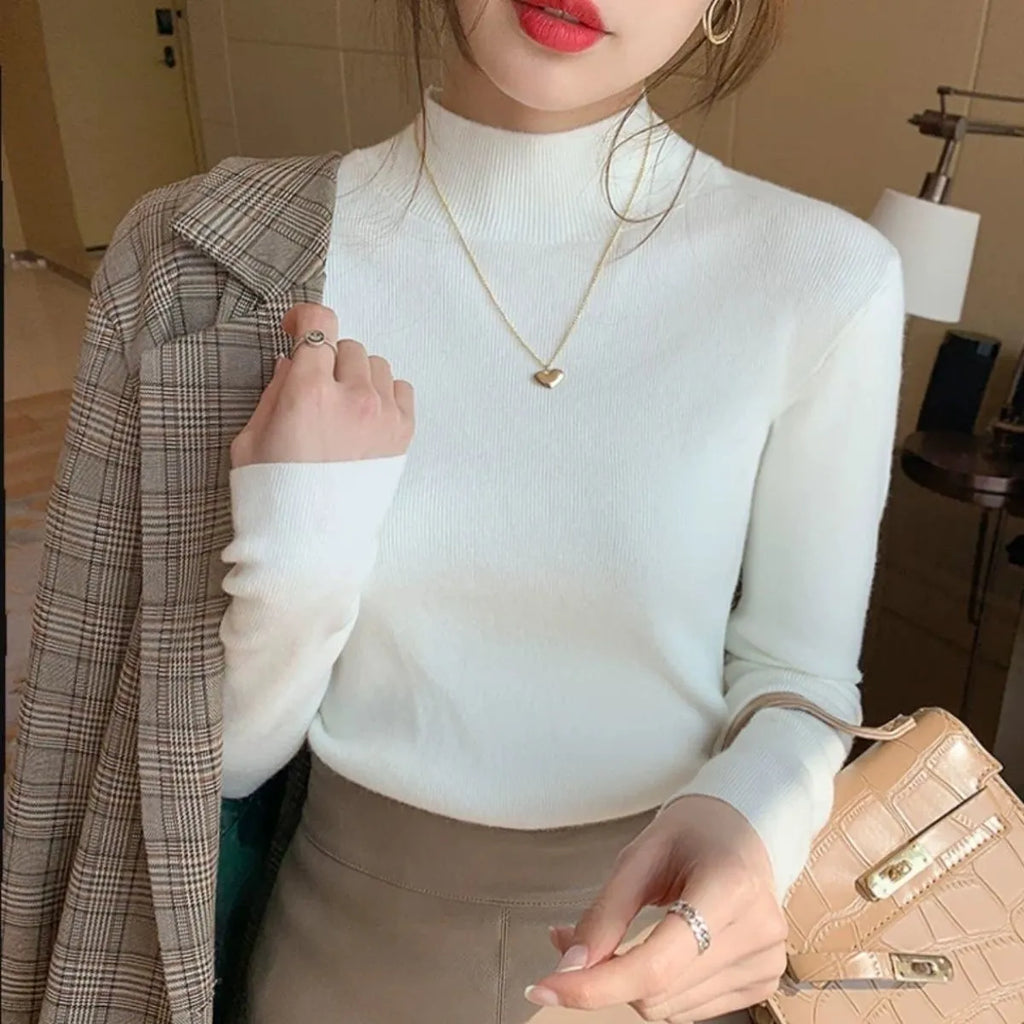 Women's slim fit viscose knitted shirt in apricot colour with long sleeves