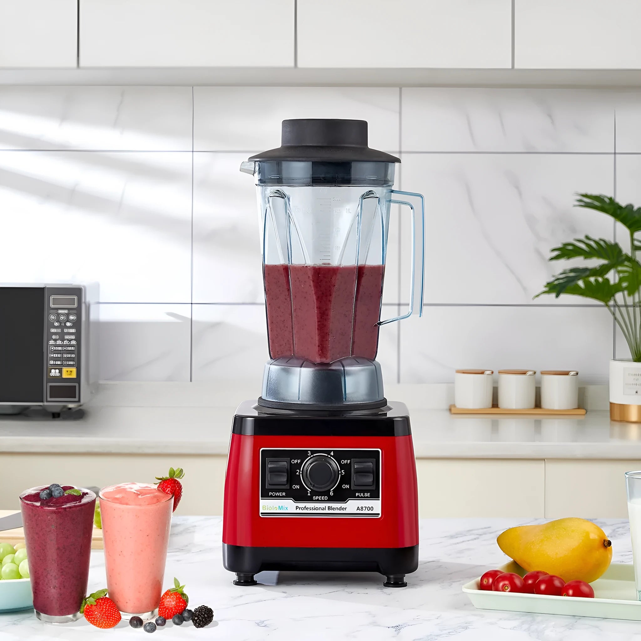 Red A8700 commercial blender with 2-litre jug and 2200W motor on a countertop.
