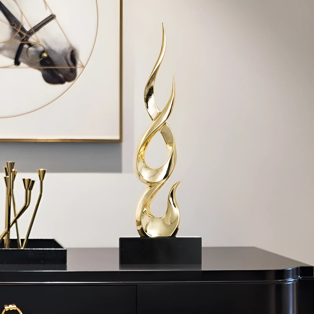 Festival high-rise decoration ornament in resin and plastic showing bright gold finish and modern simplicity style