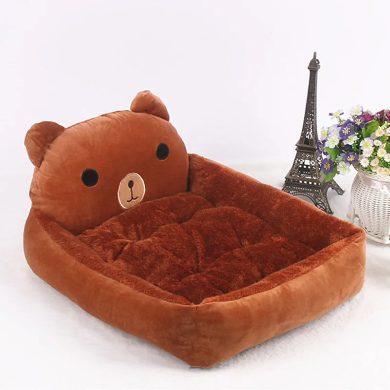 A cartoon-style washable pet bed sofa for small dogs and cats, shown in a blue colour.