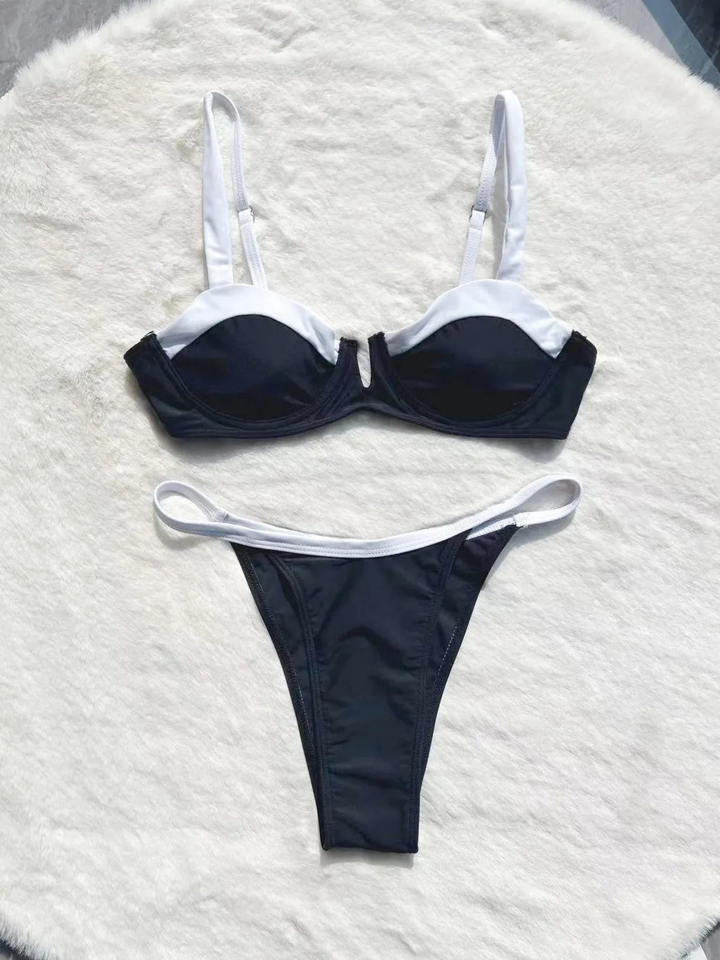 Black low waist bikini with stitching split detail on briefs