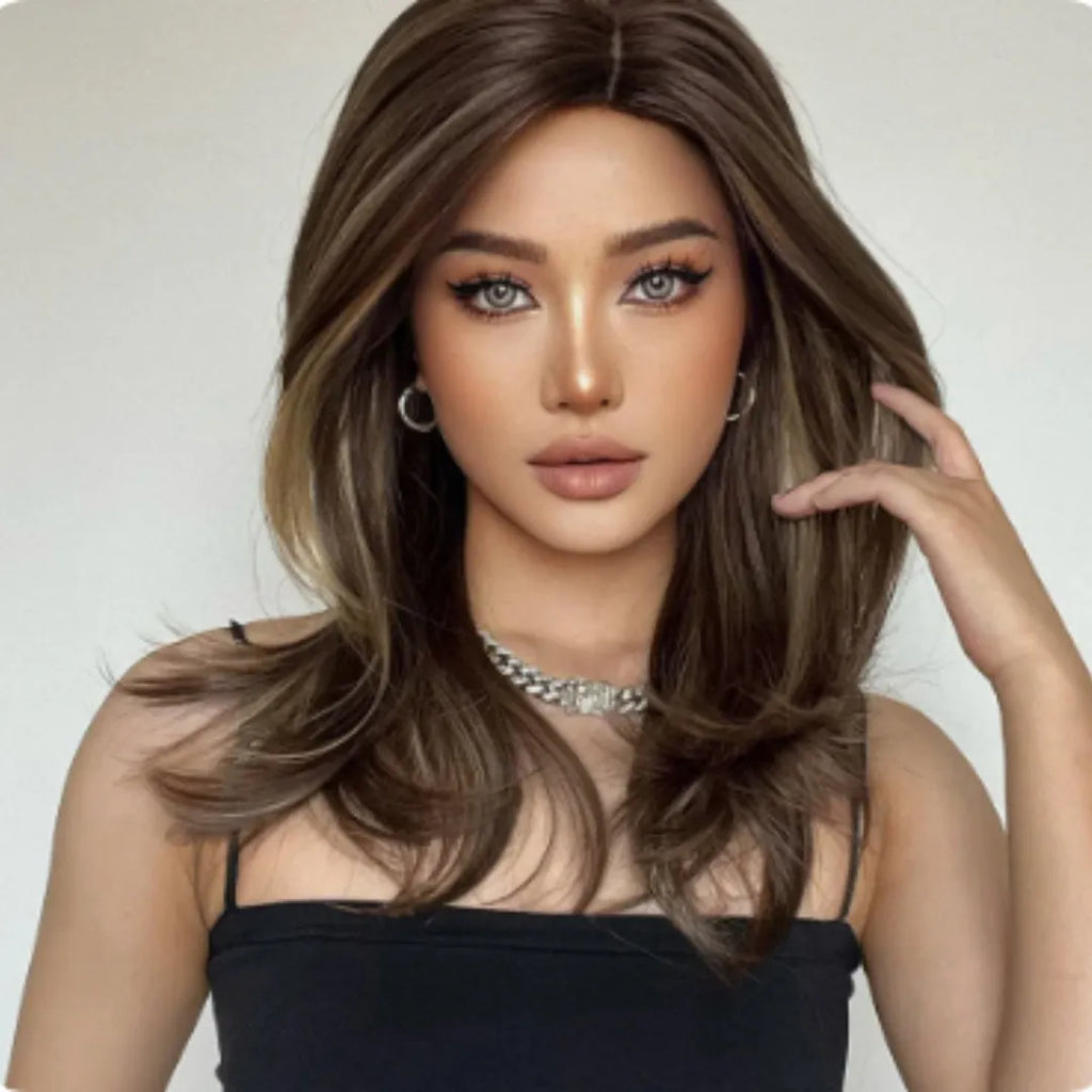 Mid-length platinum gradient synthetic wig with long curly hair and full bangs