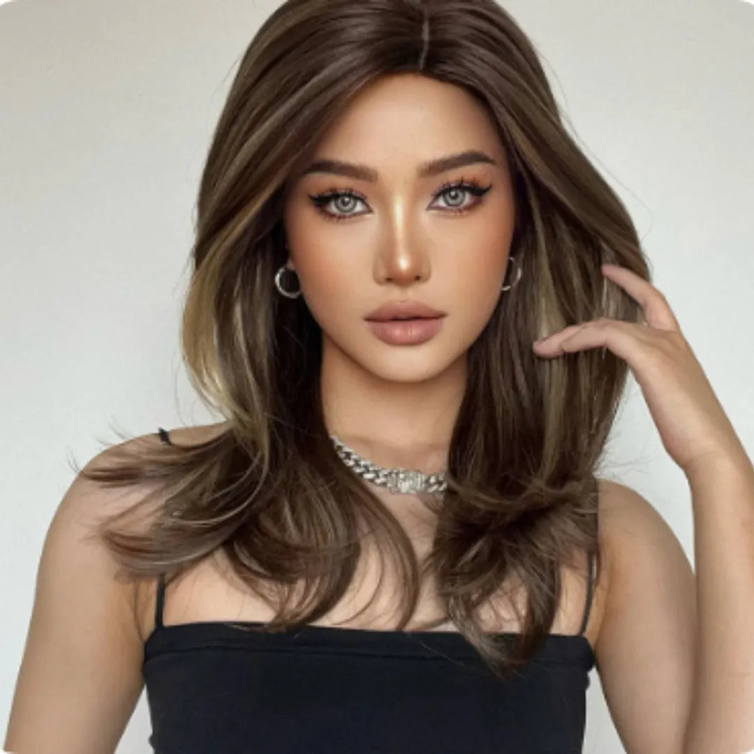 Mid-length platinum gradient synthetic wig with long curly hair and full bangs