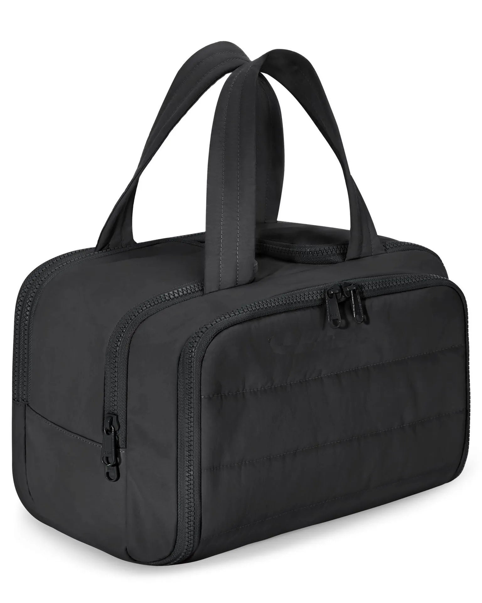 Large lightweight travel toiletry bag in black with wide opening, showing fluffy polyester material.