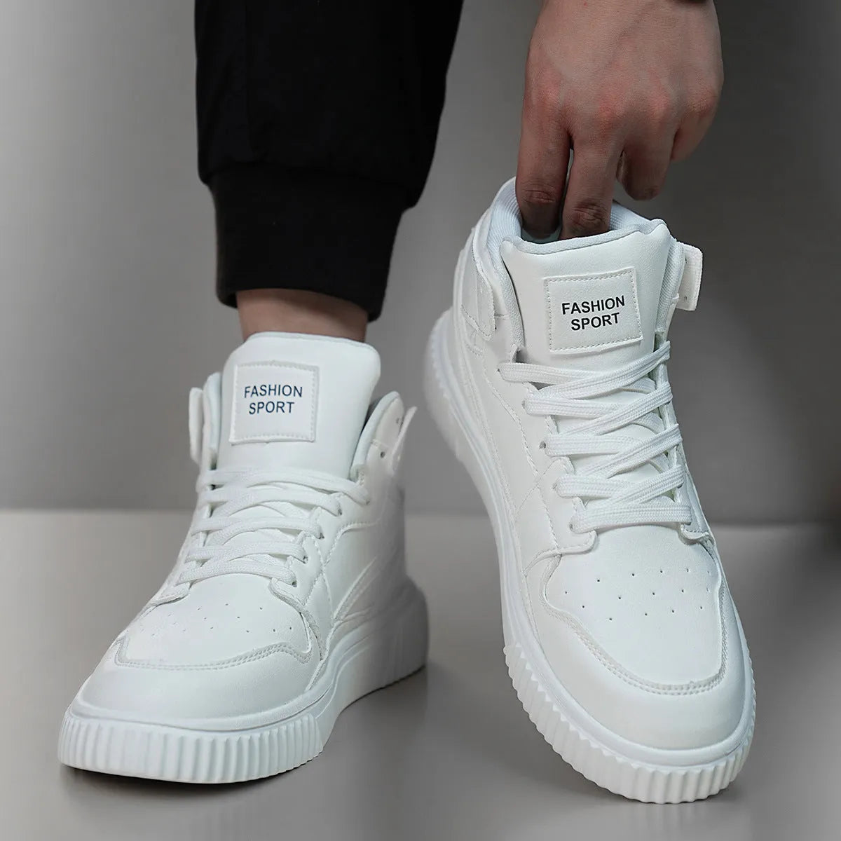 Men's white casual shoes with round toe and microfiber upper in solid color design for autumn winter leisure wear.
