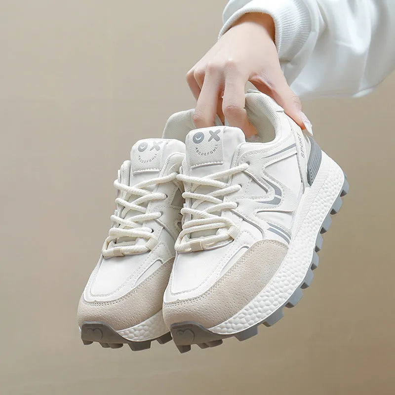 Women's black lace-up platform casual sports shoes with round toe and flat heel.