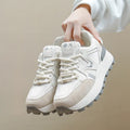 Women's black lace-up platform casual sports shoes with round toe and flat heel.