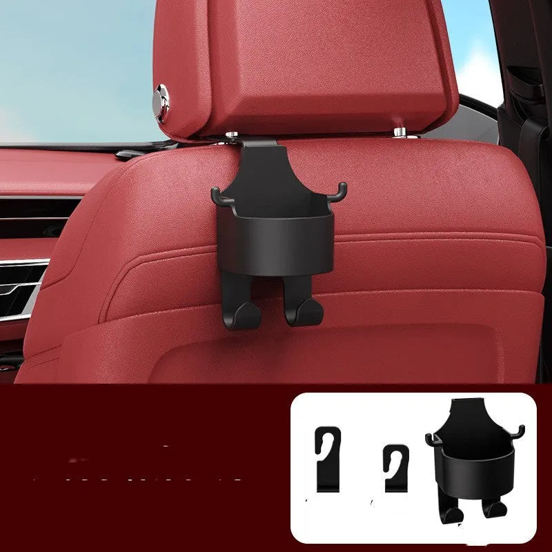 Black plastic car seat back organiser with cup holder and storage hooks for vehicle interior organisation
