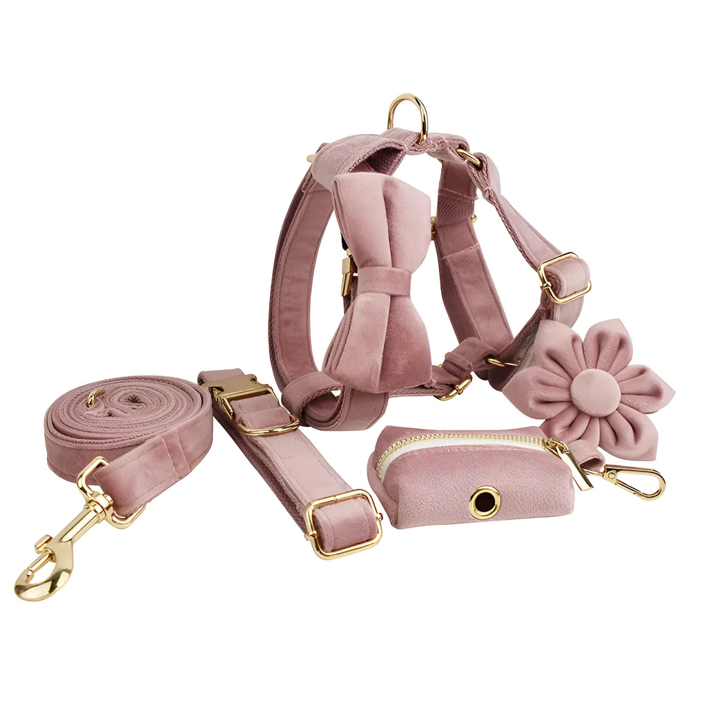Light purple pink velvet dog collar set with leash, vest, bow, and poop bag accessories