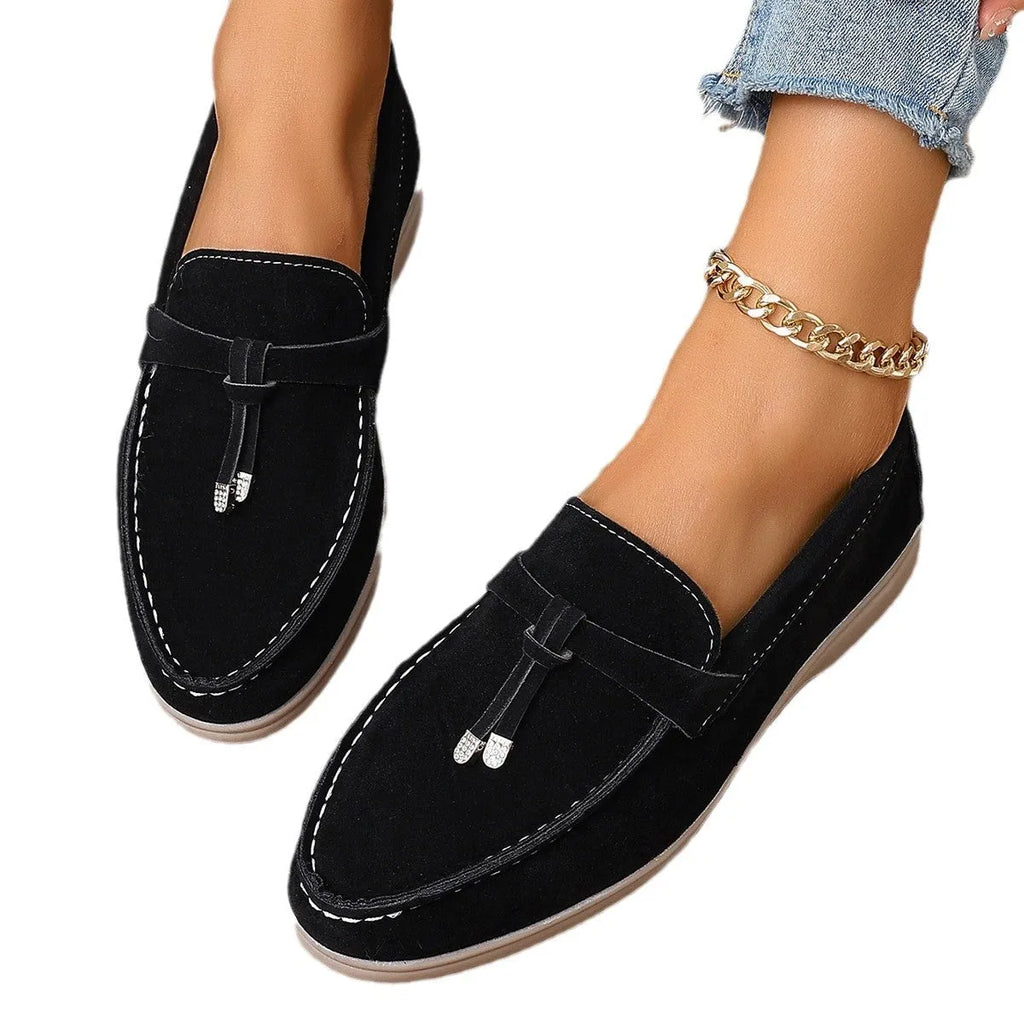 Canvas gommino slip-on loafers with platform heel in black, apricot, and brown colours