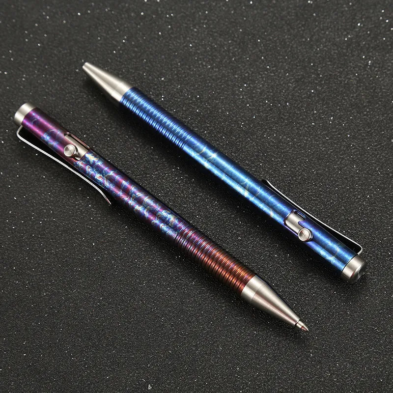Titanium alloy tactical pen with gun bolt handle in a phantom colour finish.