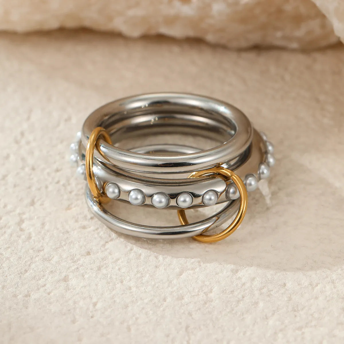 Stacked colour matching stainless steel ring set with 18K gold plating in free size