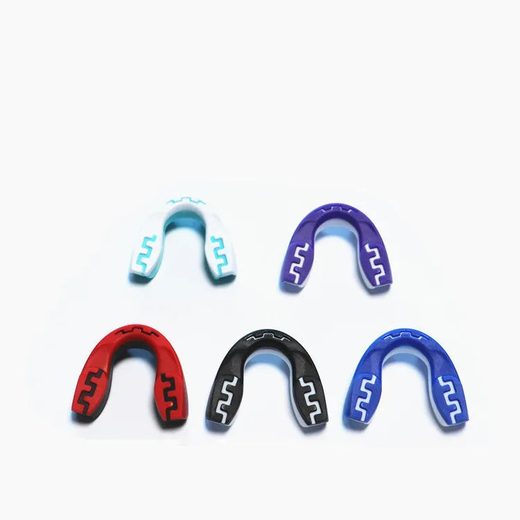 Adult boxing mouthguard with printed teeth design for martial arts and Taekwondo protection.