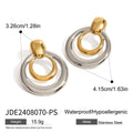 Round gold-coloured geometric hollow stud earrings on a white background.