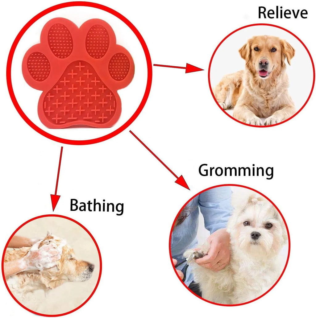 Blue silicone dog licking mat with bone texture and suction cups on a white bathroom tile.