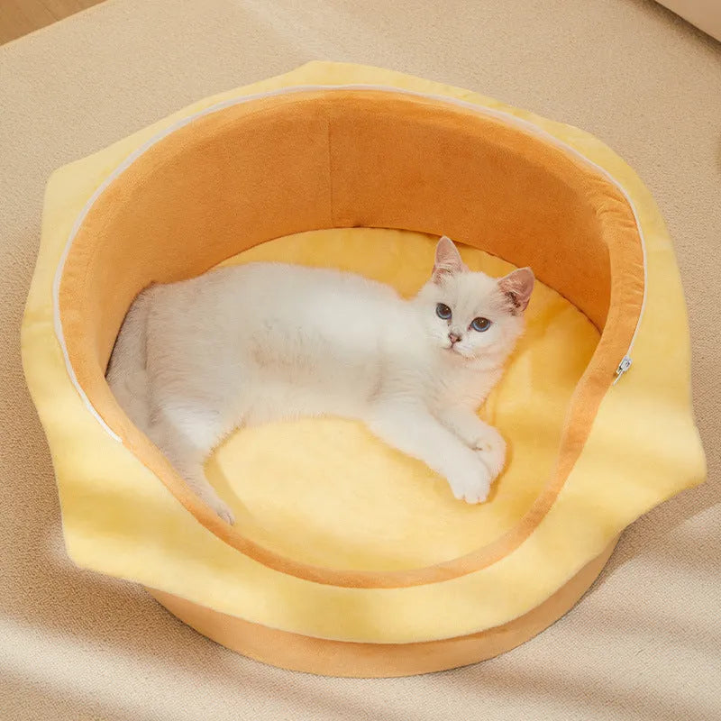 Medium-sized grey cat kennel with a removable roof panel and a soft beige cushion inside.