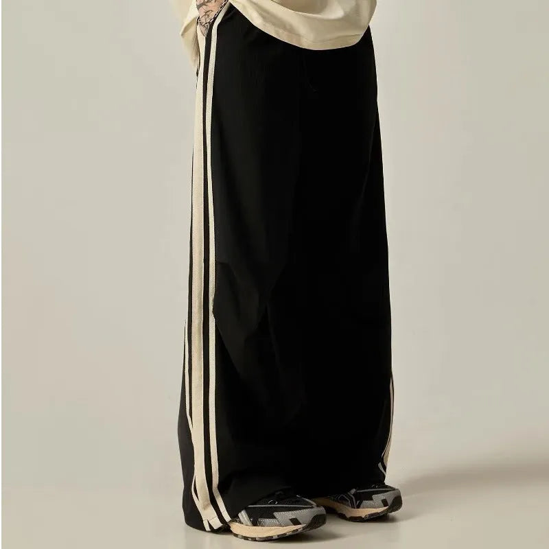 Men's black wide-leg climbing trousers with high waist and straight-leg design for summer outdoor activities