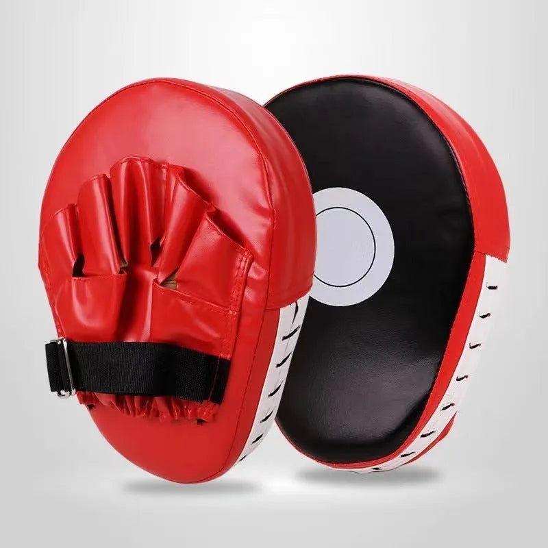 A pair of PU punch mitts for boxing and Muay Thai training, shown in a red edge and black surface colour variant.