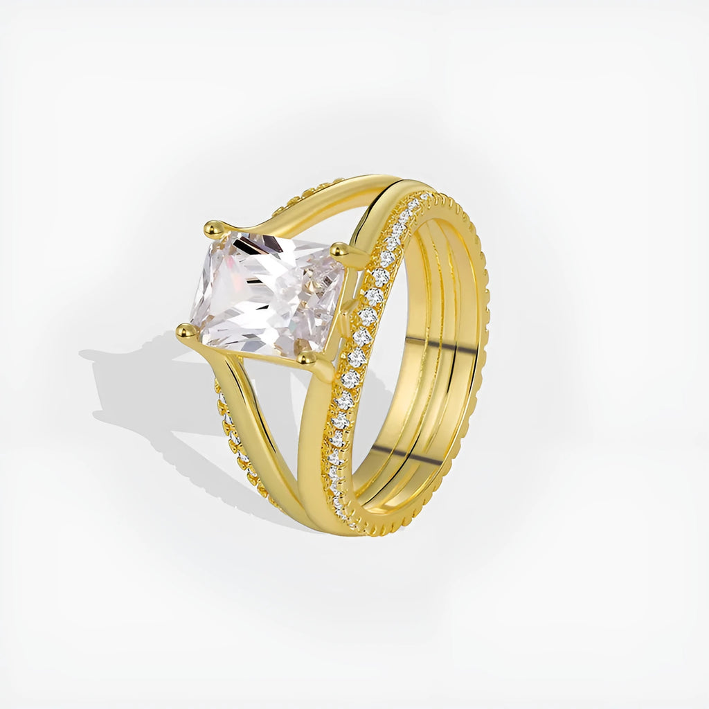 Gold geometric zircon ring for women on a plain background, showing its electroplated copper construction and minimalist design.