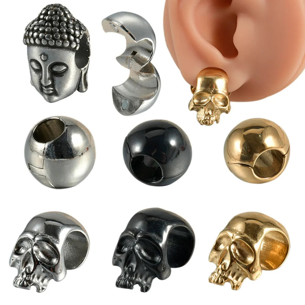 Stainless steel geometric earrings with hollow skull and Buddha head design in electroplated colour options.