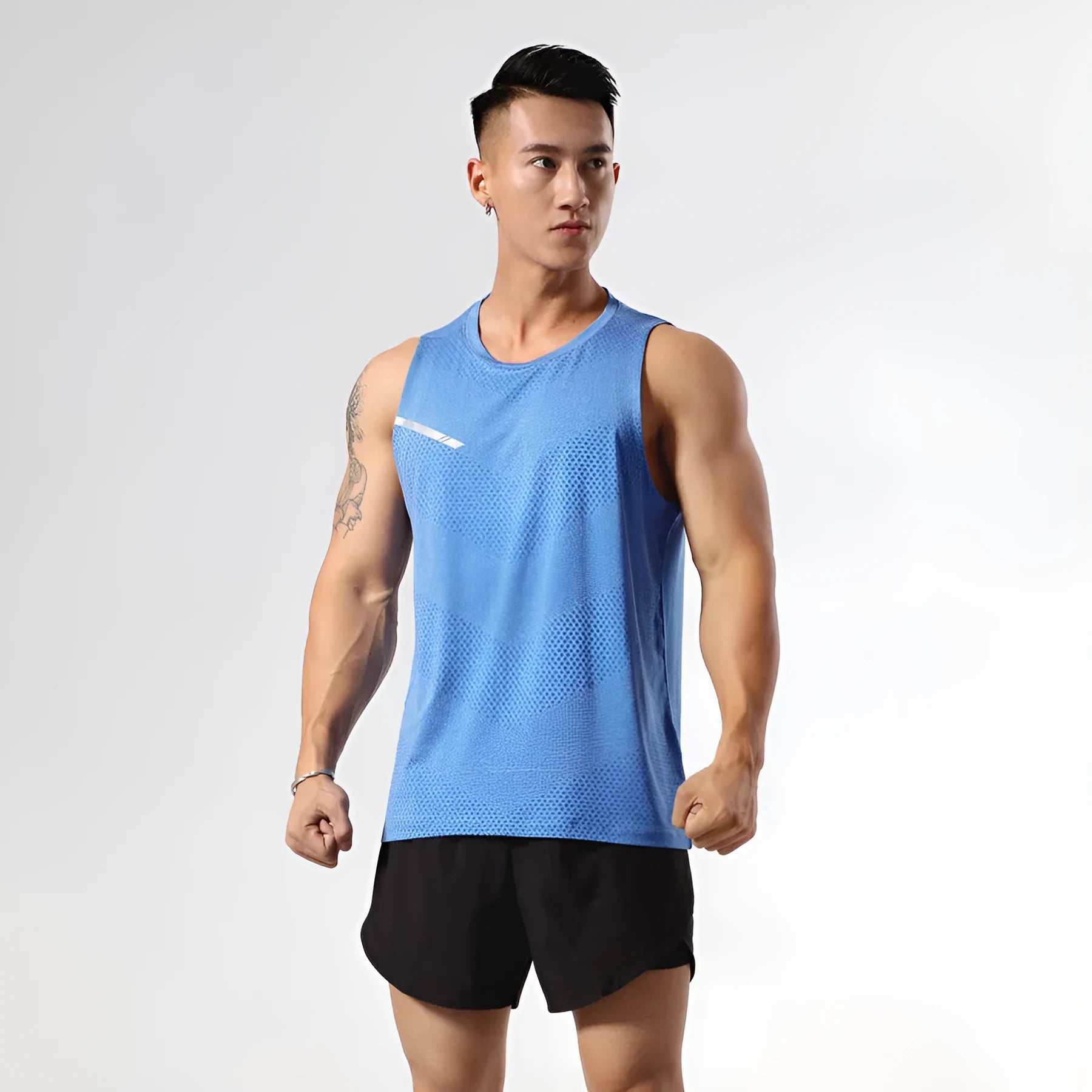 Men's solid colour quick-drying polyester sport tank top for summer sports.