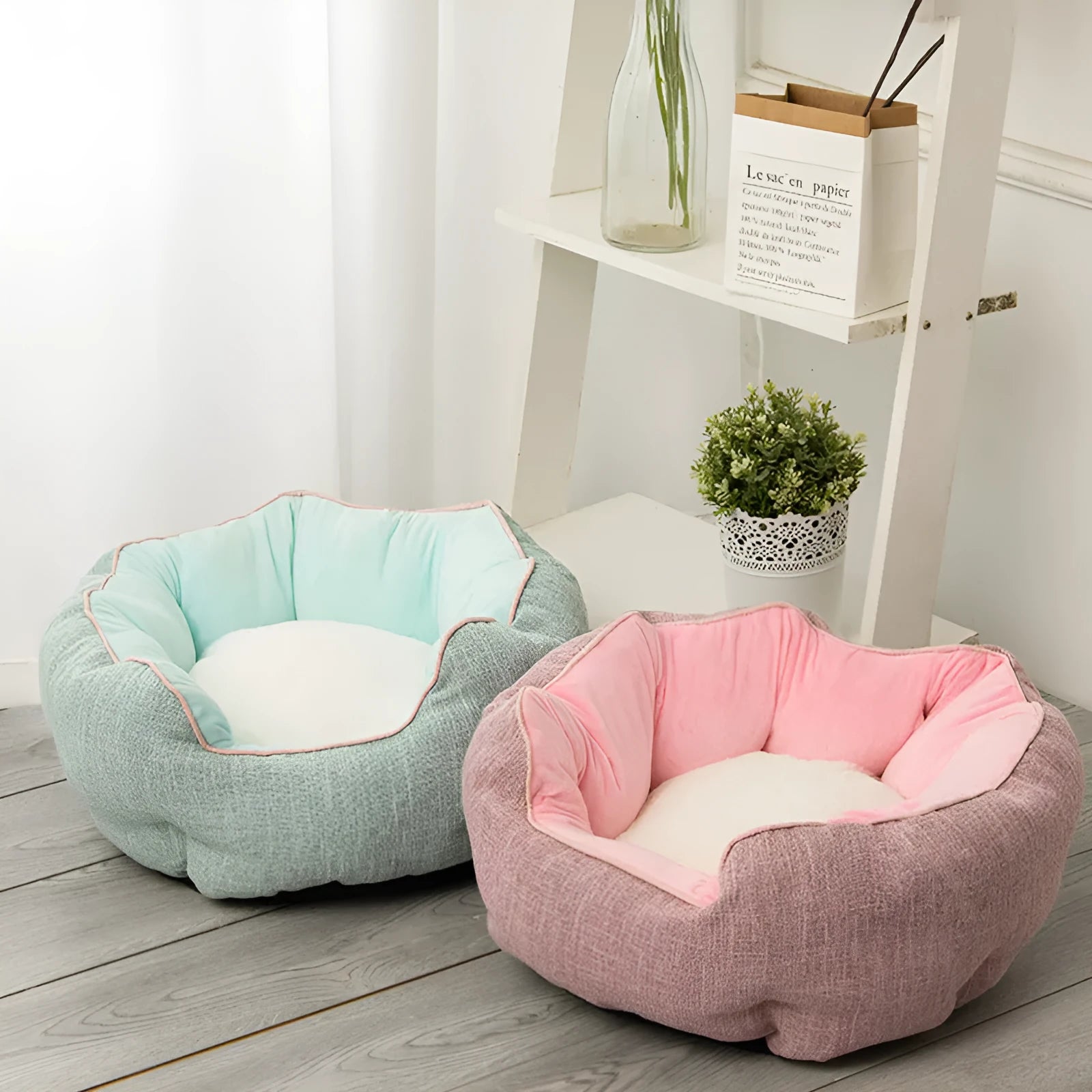 Blue octagonal pet sofa bed with a removable central mat for a small dog or cat.