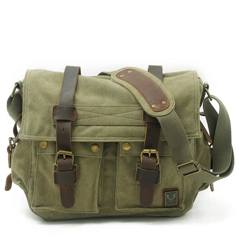 Men's brown retro canvas crossbody shoulder bag with cowhide trim, shown with flap open revealing internal zip pockets.
