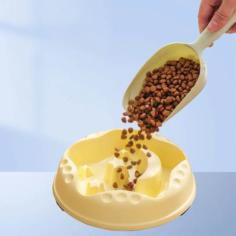 Moon Star Wings ceramic dog slow feeder bowl with raised centre ring and non-slip base in blue, grey, green, pink, or yellow.
