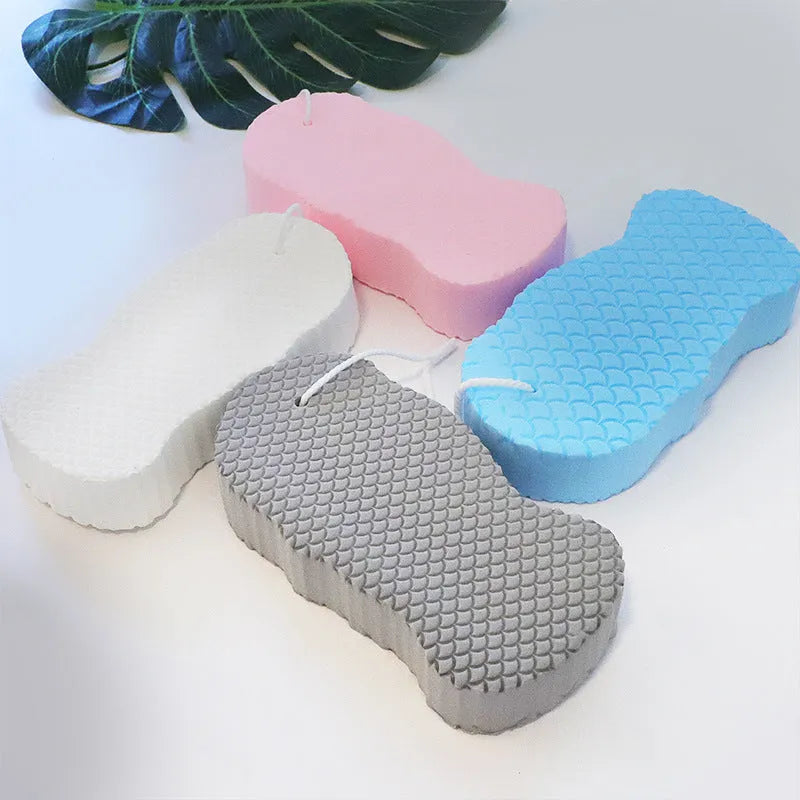 3D fish scale pattern bath sponge ball in white, grey, pink, and light blue colours