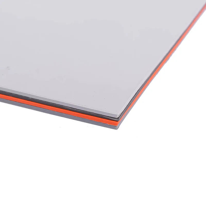 Dark gray laser engraving pad A4 size 23mm thick on workbench