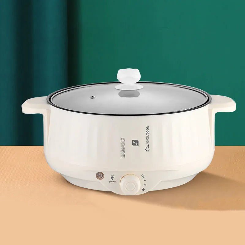 Non-stick electric hot pot with integrated heating element in stainless steel body, available in multiple sizes