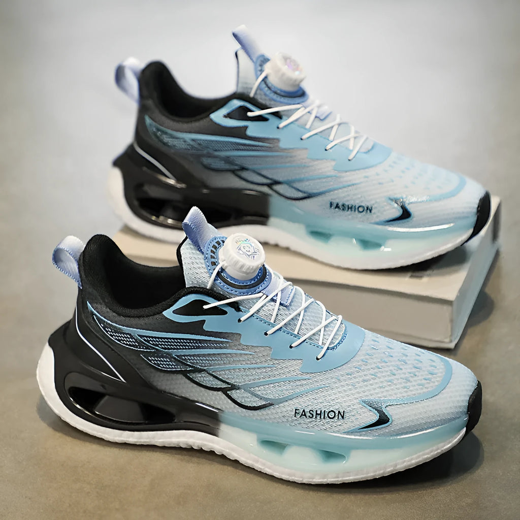 Youth men's low-top rotating button sneaker in light blue mesh with a rubber sole.