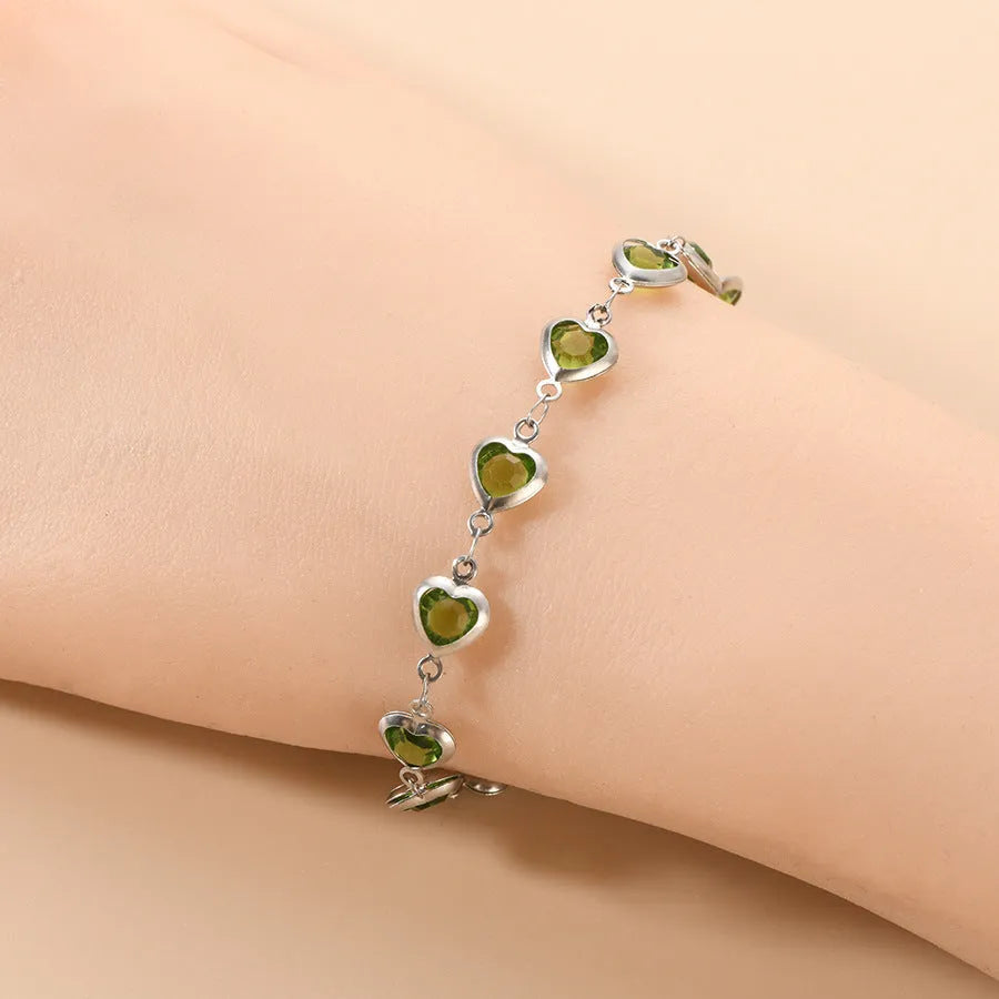 Devil's Eye geometric heart bracelet in stainless steel showing six colour options on white background