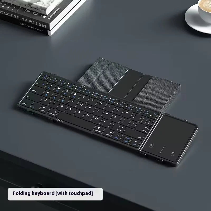 Black folding Bluetooth keyboard for mobile devices with compact dimensions
