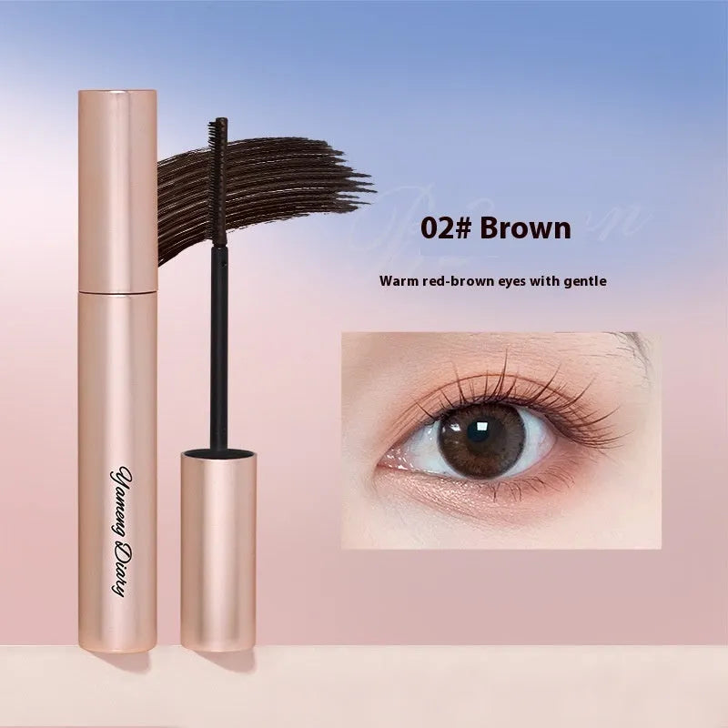 Long curling mascara tube in black and brown colour options for volumised, lifted lashes