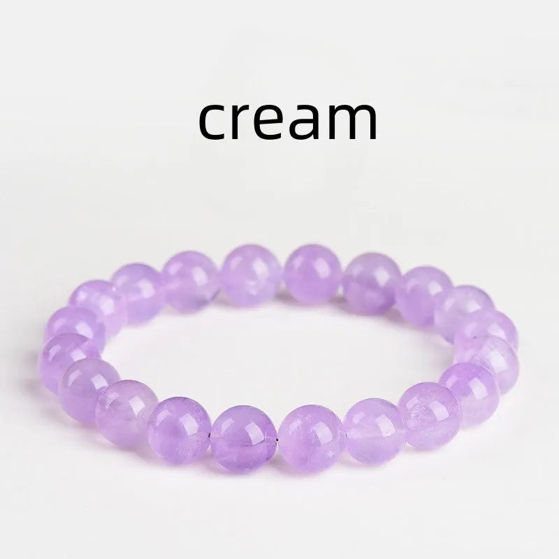 Lavender amethyst bracelet with round beads in a water ripple pattern, showing cream body and transparent colour options.