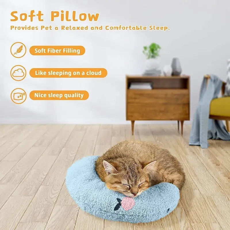 Small blue U-shaped plush pillow for cats or small dogs on a white background.