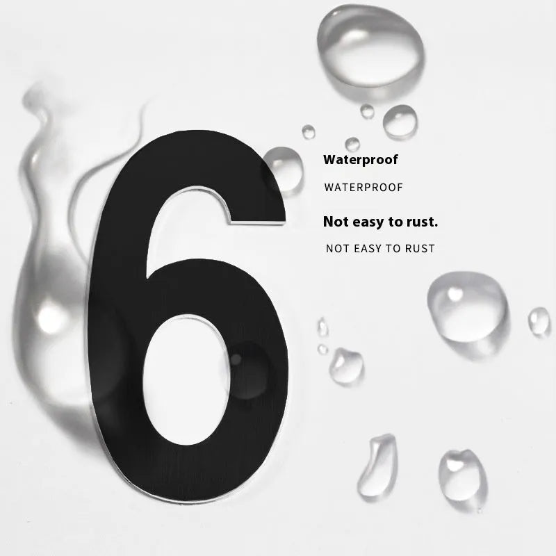 Black stainless steel sticky house number sign with 7.5cm characters and adhesive backing