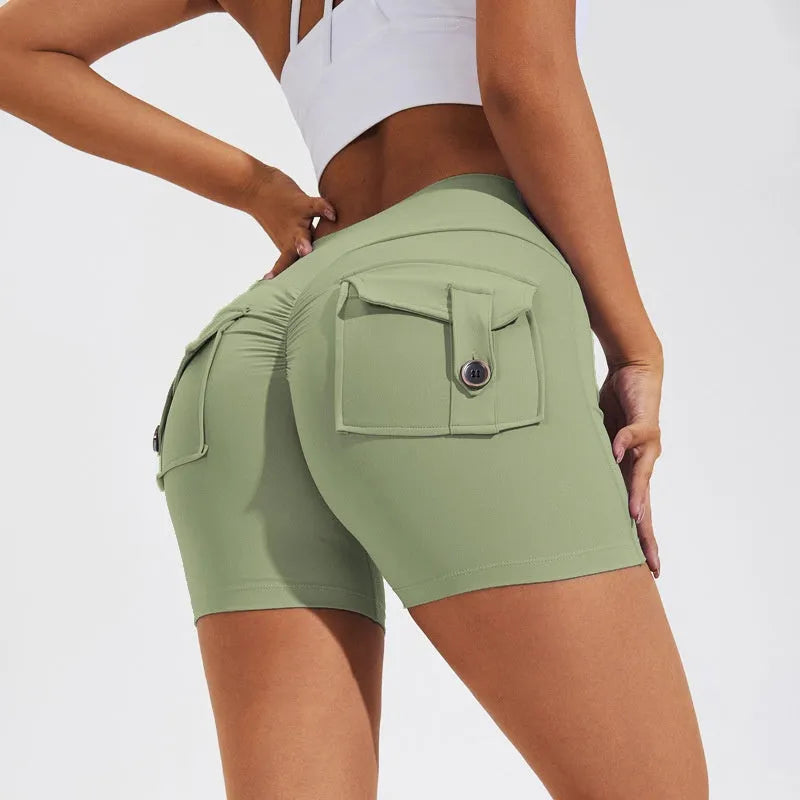 Women's high waist hip lifting sports shorts with side pockets in electric blue colour