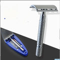 Double edged safety razor with blade and storage box on white background