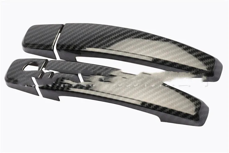 Carbon fibre pattern door handle overlay for Opel Vauxhall Astra car interior