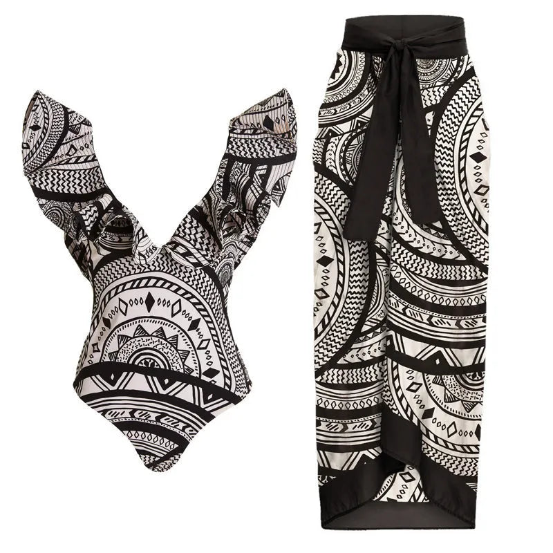 Women's vintage print one-piece swimsuit with deep V-neck and ruffles, shown with matching wrap skirt.