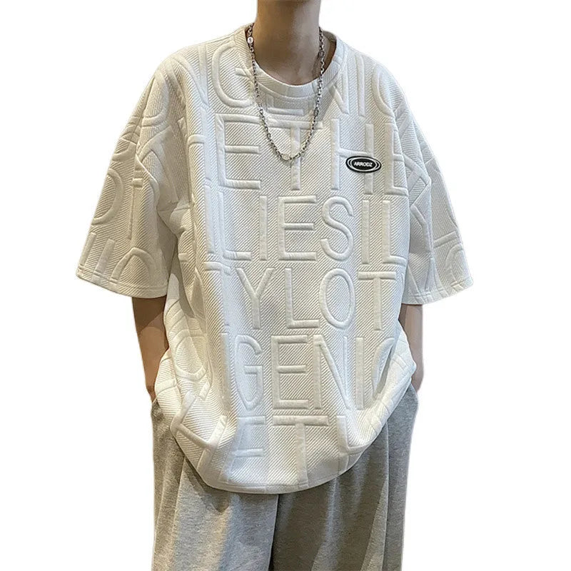 Men's grey t-shirt with raised three-dimensional letter pattern on chest, short sleeve loose fit
