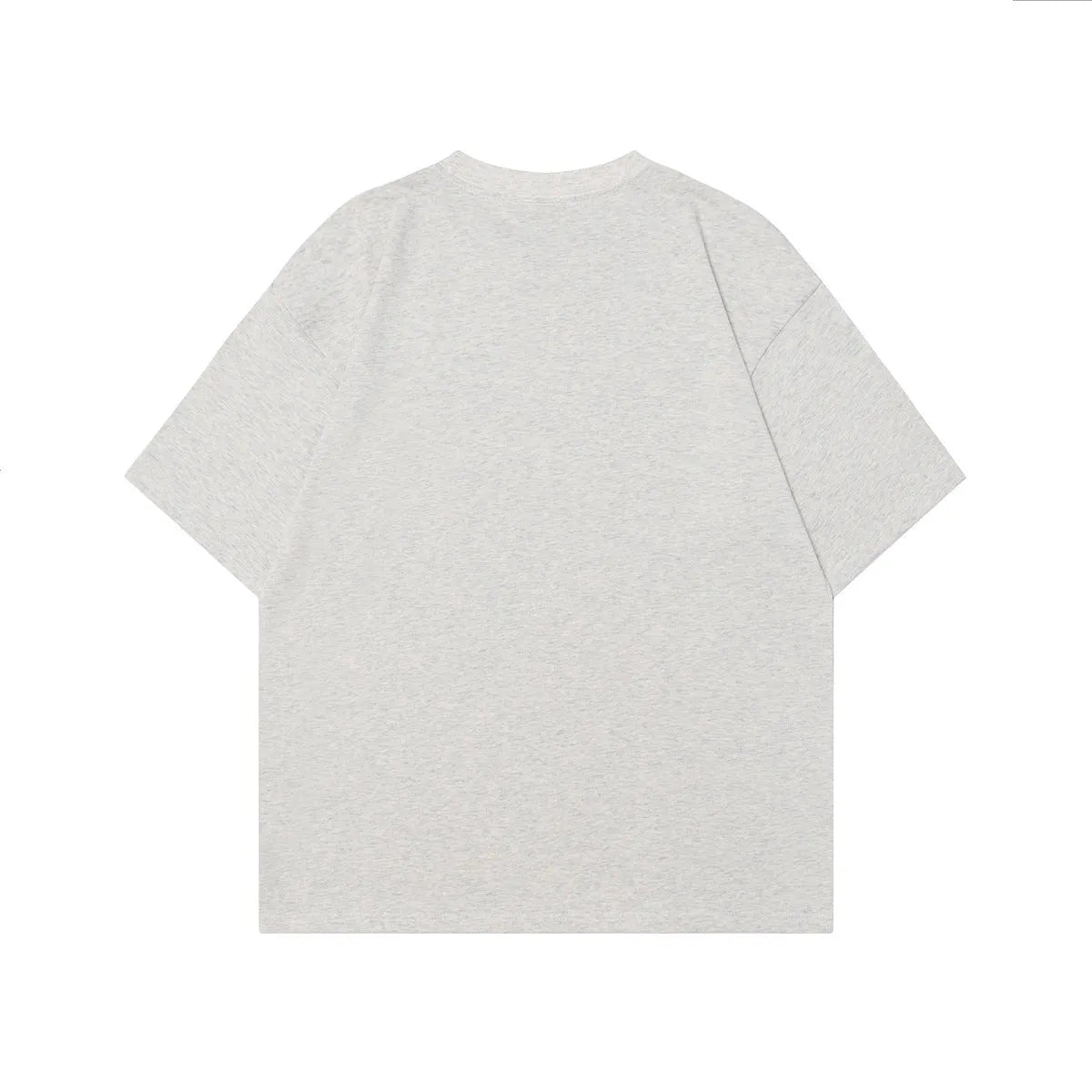 Men's loose-fit black cotton t-shirt with a retro character design print on the front.