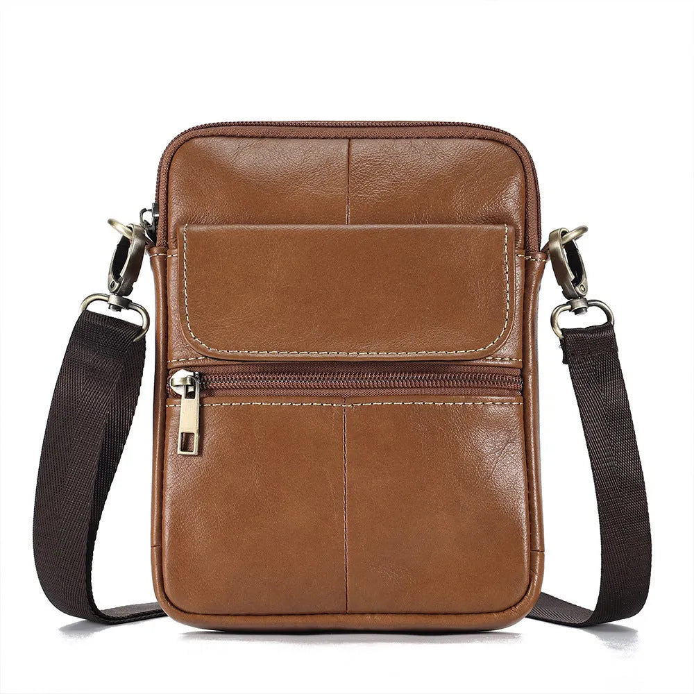 Men's brown genuine leather crossbody shoulder bag showing sewing line detailing