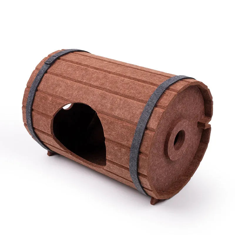 Assembled wine barrel shaped cat bed made from brown polyester fibre felt.