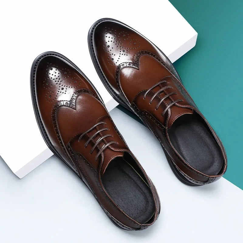 Men's black and brown brogue leather shoes in business style with traditional detailing