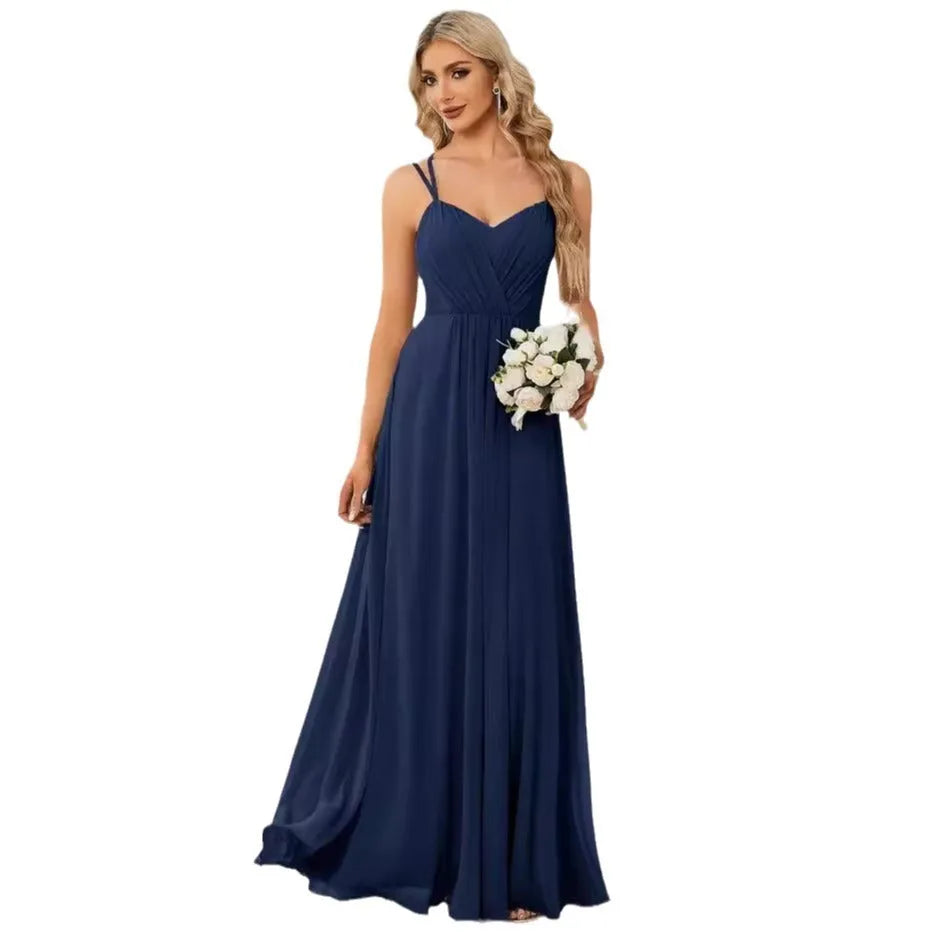Women's sleeveless pleated A-line long dress in light green, shown in a solid colour with a long skirt.