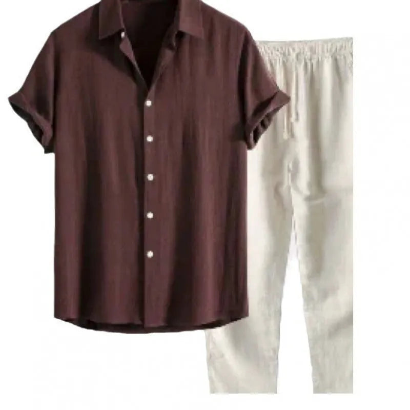 Man wearing a loose-fit light-coloured linen short-sleeve shirt and matching casual trousers from a two-piece suit set.