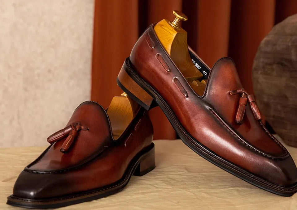 Men's black genuine leather slip-on loafers with rubber sole and pigskin lining